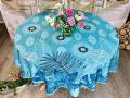 Nappe Feuillage, sur un fond turquoise, ronde Ø 160 cm, 100% polyester anti-taches